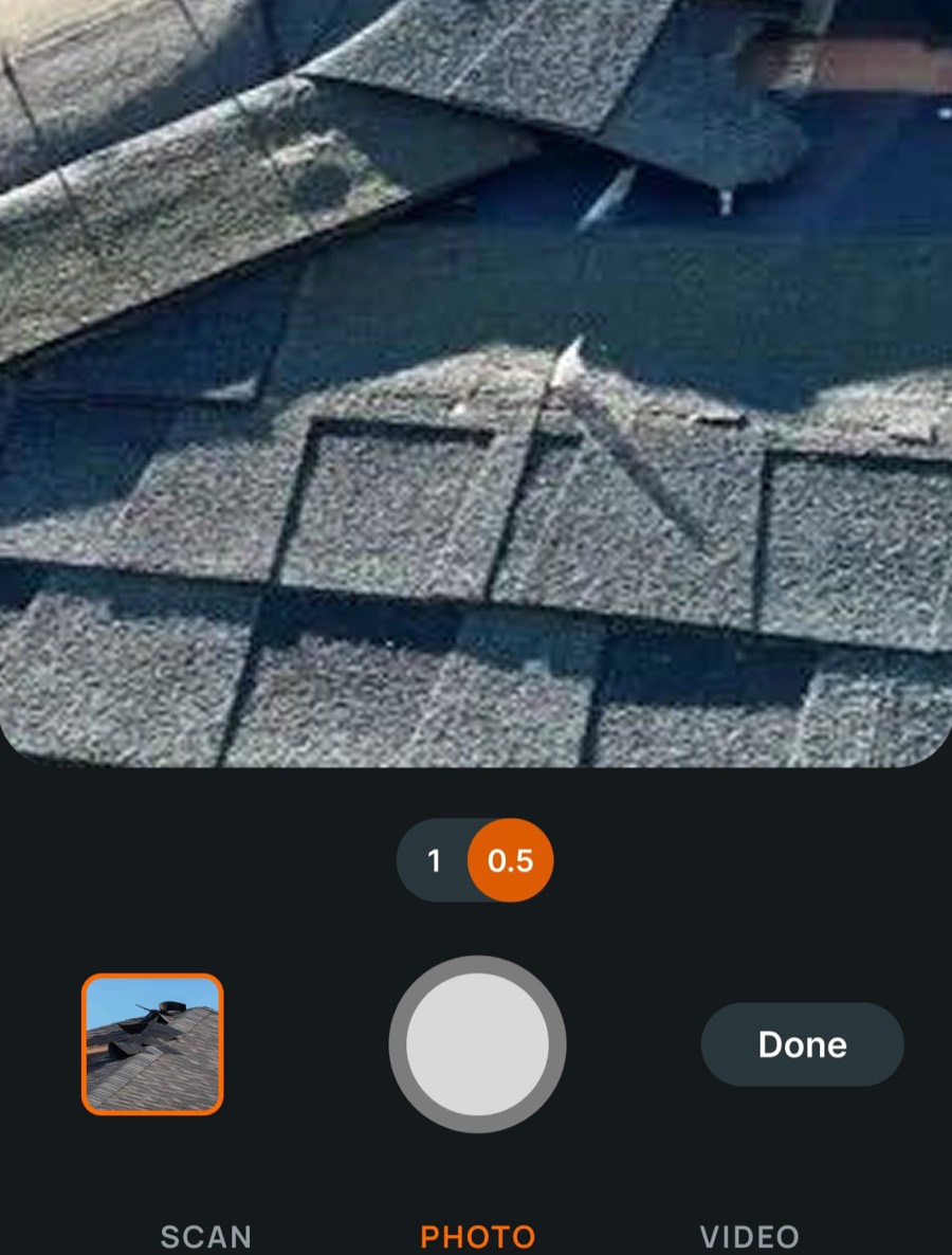 Field Inspect camera screen showing damaged roof shingles